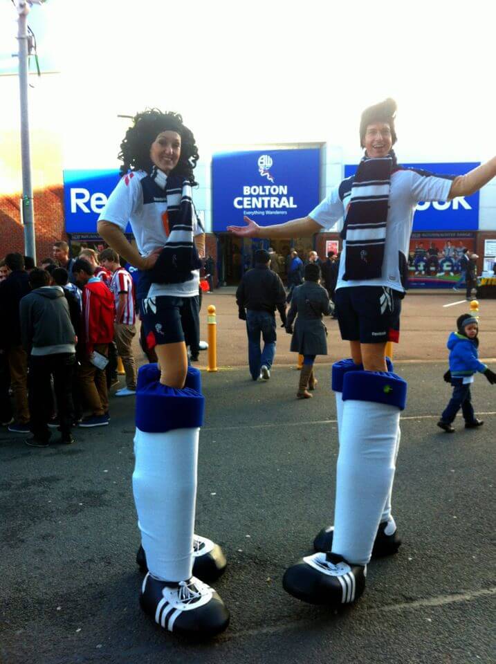 Football themed stilt walkers for hire